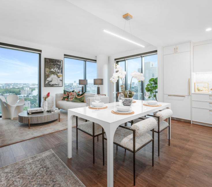 Floor to ceiling windows and open concept floorplan options  Open concept kitchen and living room