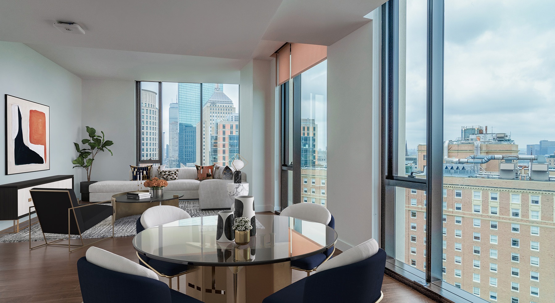 Spacious well lit living room with large floor to ceiling windows 